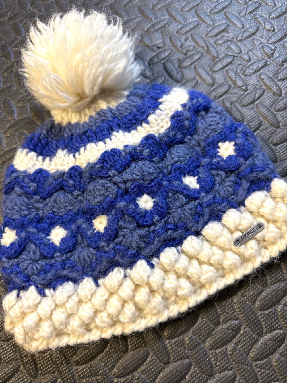 PrAna Women’s Rose Crochet Wool Blend Fleece Lined Pom Pom Beanie Ivory & Blue